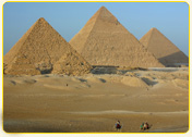 The Pyramids of Giza, a group of ancient pyramids located in Egypt, showcasing their distinct triangular shapes.