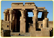 Temple ruins in Egypt showcasing ancient architecture with columns and stone structures.