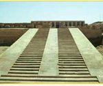 Stone steps leading to a temple structure in Egypt, showcasing ancient architectural design.
