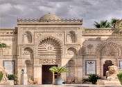 Entrance of a historic building with ornate architectural details and decorative elements in Egypt.